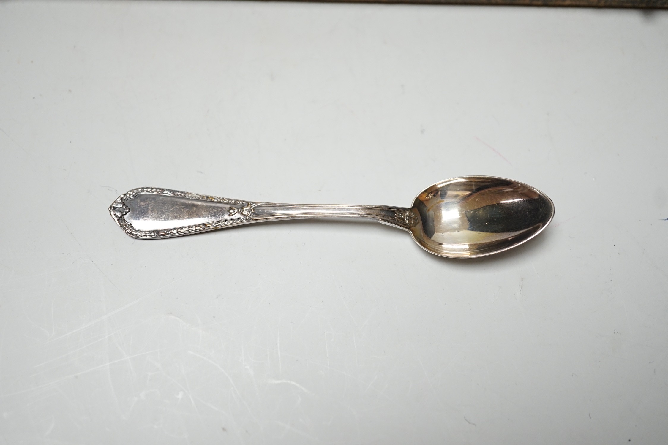 A cased set of twelve Belgian? 800 standard white metal coffee spoons, 10.2cm, 4.7oz.